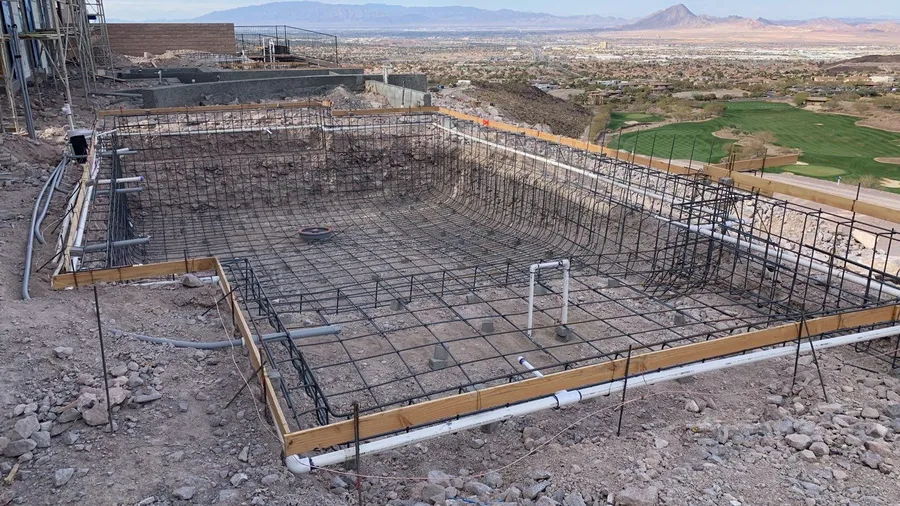 Laying out Pool Foundation in residential home backyard