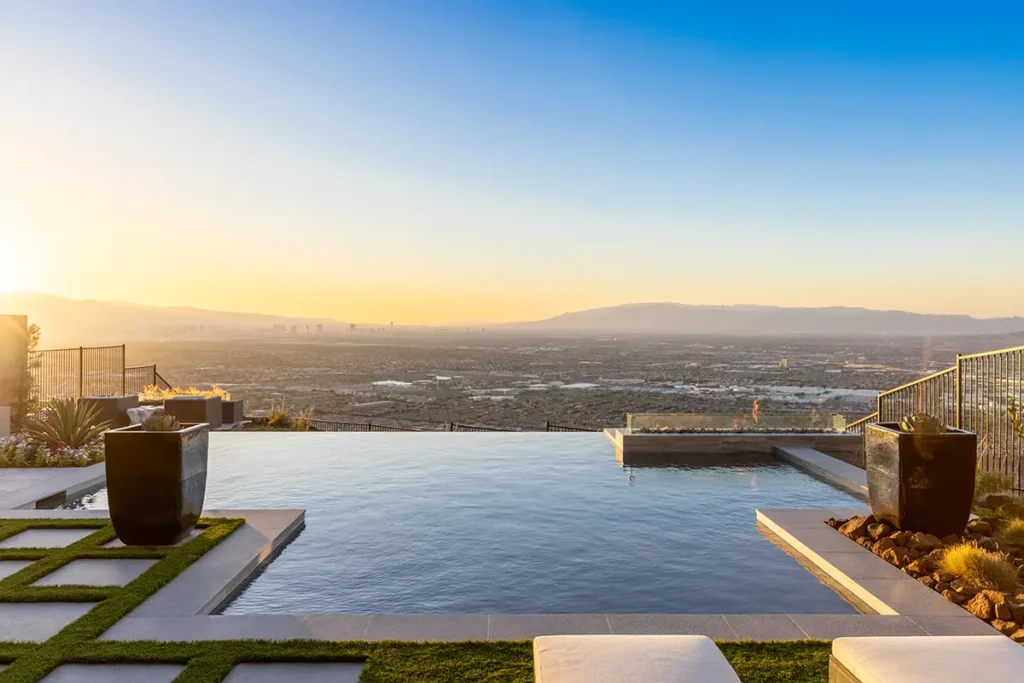 Homepage - Watters Aquatech Pool & Spa Pool with vanishing edge overlooking landscape